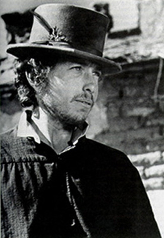 [Dylan as Alias the printer's apprentice in Pat Garrett and Billy The Kid]