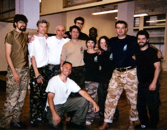 [The 2004 Fighthouse class with our instructor Edgars (second from left), Vladimir Vasiliev (center) and instructor Denis Dmitriev (second from right)]